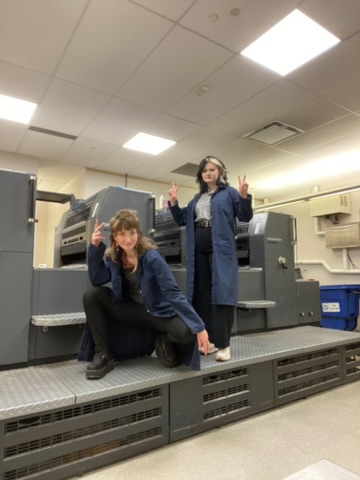 My friend Laura and I being almost as slick as offset lithography